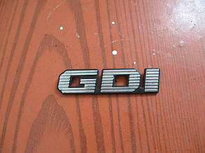 Емблема кришки багажника GDI MR912012 9919509 Carisma Mitsubishi