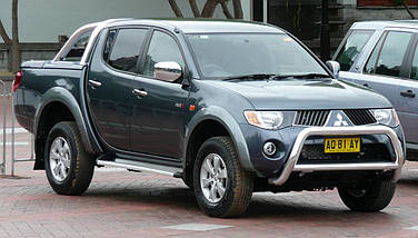 Амортизатор передній Mitsubishi L200 від 2005 р. з двигуном 2.5, амортизатори Mitsubishi L200, фото 3