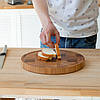 Кухонна торцева обробна дошка кругла дуб ясень д30 см велика на силіконових ніжках BeWoody, фото 3