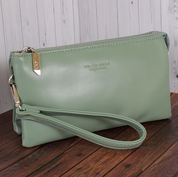 Сумочка клатч зеленого кольору на змійці