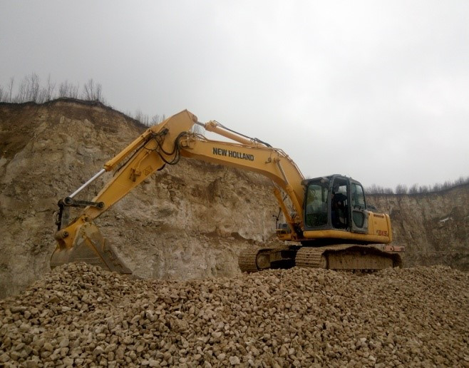 Послуги гусеничного екскаватора NEW HOLLAND E245B, вантаження гірської маси і розкрив