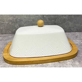 Маслянка фарфорова на бамбуковій підставці Interos 20 см PJ03449