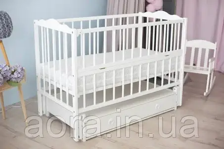 Дитяча кроватка Ангеліна з маятником і шуфлядою колір Білий