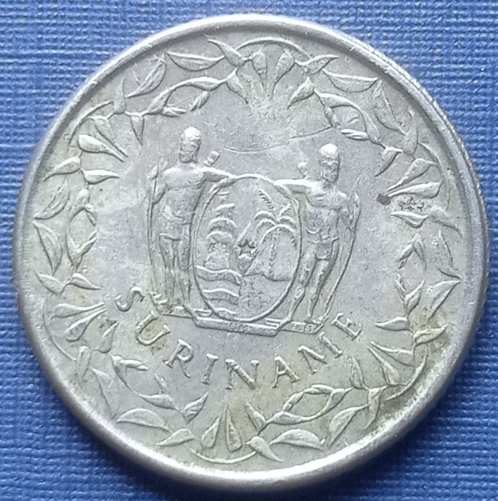 Монета 25 центов Суринам 1979 1976 две даты цена за 1 монету - фото 4 - id-p360409163