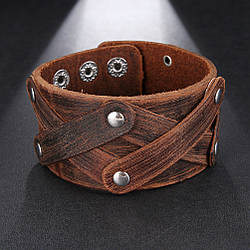 Шкіряний браслет з прорізами і заклепками