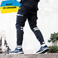 Зауженные карго штаны черные на липучках с рефлектом мужские от бренда ТУР Райот размер S, M, L, XL, XXL