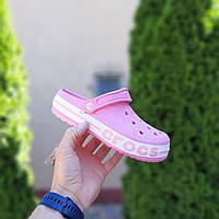 Шлепанцы розового цвета Crocs на лето. Женские шлепки Crocs розовые. Женские тапки Крокс розовые