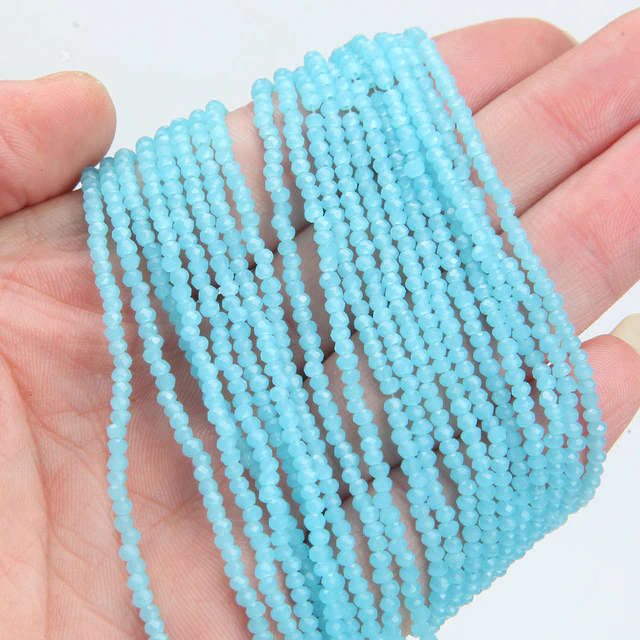 Бусини кришталеві (Рондель) 4х3мм пачка — 125-135 шт., колір — Небесний блакитний непрозорий з АБ