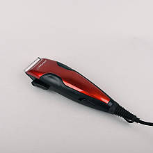 Машинка для стрижки волосся Maestro MR-650C з 4 насадками, синього або червоного кольору.