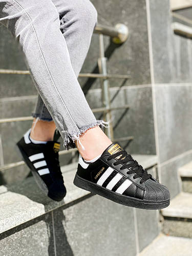 Adidas superstar black on black sales