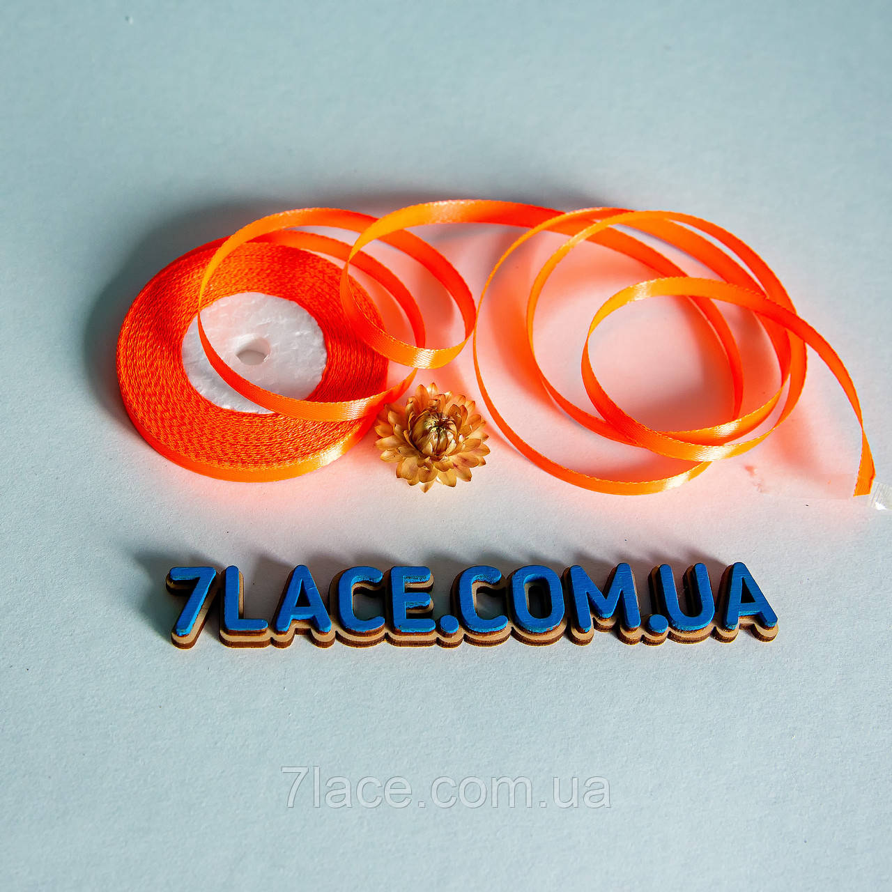 Стрічка атласна однотонна / колір ПОМАРАНЧЕВИЙ НЕОН / ширина 0,6 см / бобіна 23 м