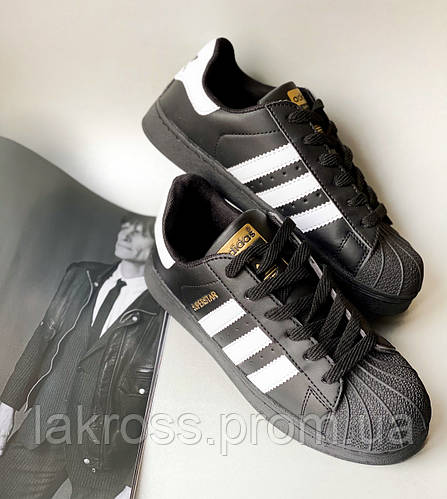 Adidas black superstar sales