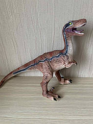 Іграшка динозавр, що видає звуки