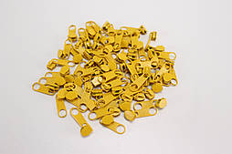 Бігунок металевий жовто-жовтогарячого кольору для рулонної блискавки No БМ-152-Т3