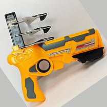 Дитячий іграшковий пістолет з літачками Air Battle катапульта з літаючими літаками (AB-1). Колір: жовтий, фото 2