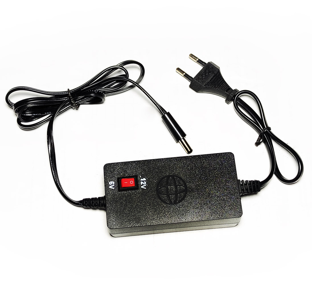 Зарядний пристрій для дитячого електромобіля 6/12V круглий штекер, фото 1