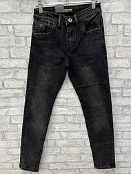 Підліткові МОМ джинси в чорному кольорі з потертостями в розмірі 25 і 26