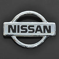 Эмблема "Nissan" пластик/2 пукли/маленькая 50х69мм