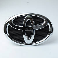 Емблема "Toyota" 185x130м пластик/8 пуклі (HILUX 2015> перед) у складі (Польща) 753100K010