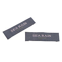 Этикетка тканевая вышитая шт. Sea Rain 1,6см серый