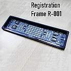 Рамка номерного знаку з захисним амортизатором.