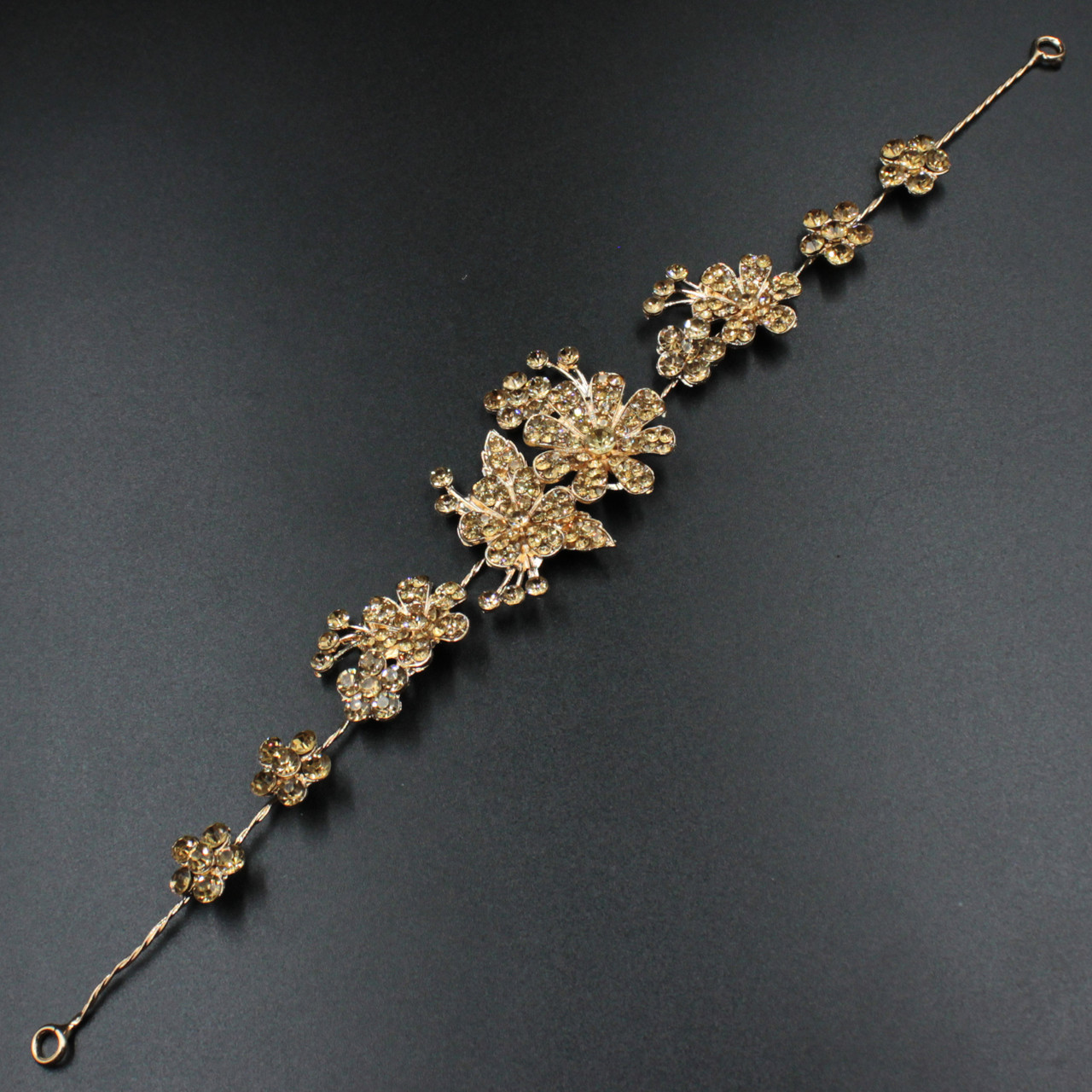 Гілка в зачіску для волосся металічна золотава зі стебломи з квіточками 28 сантиметрів з двома неведими