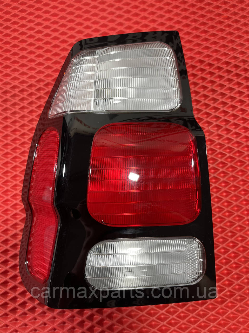 Ліхтар задній лівий Mitsubishi Pajero Sport 1 1997-2008 Новий аналог