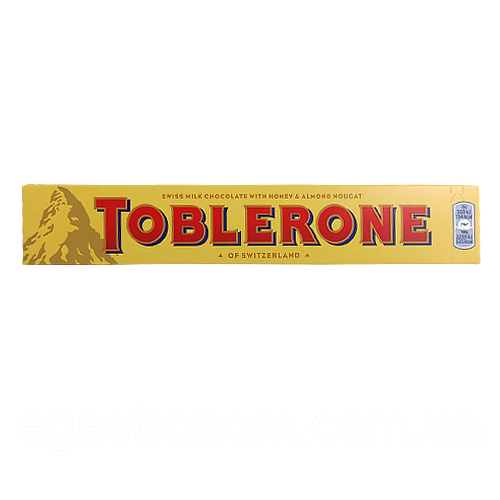 Шоколад молочний з медом та мигдальною нугою Тоблероне Toblerone 100g 20шт/ящ (Код: 00-00003475)