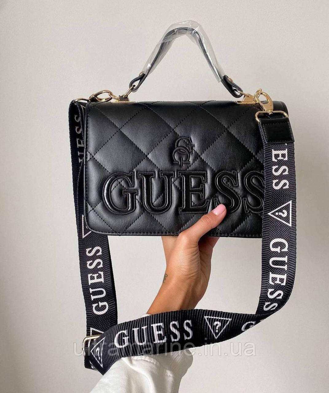 Модна жіноча чорна сумка Guess з широким ременем 26x19x7 см
