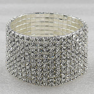 Браслет жіночий широкий сріблястого кольору з кристалами ширина 35 мм на гумці 9 рядів каменів від 15 см