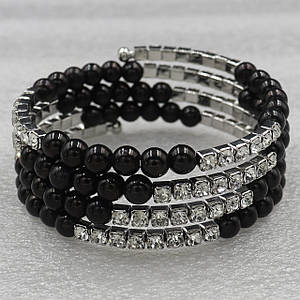 Браслет багаторядний сріблястого кольору з кристалами ширина 20 мм 4 ряди каменів і намистин чорного кольору