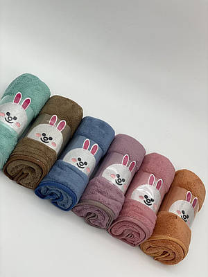 Полотенцю обличчя однотонні з зайчиками P03