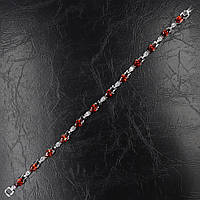 Браслет жіночий вузький м'який сріблястий із рубінами та кристалами Swarovski довжина 18 см ширина 6 мм 1ряд каменів