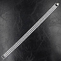 Браслет жіночий великий м'який сріблястий із кристалами Swarovski довжина 18 см ширина 10 мм 3 ряди