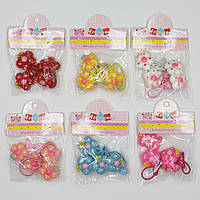 Набір шпильок і гумок дитячих пластівців тик так пачка 40 штук у стрічці квіточки різних кольорів і розмірів