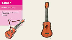 Гітара в пластиковому чохлі (130А7)