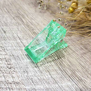 Пластиковий зажим для верхніх форм зелений 1шт