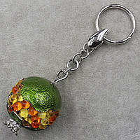 Брелок металевого сріблястого кольору покритий емаллю гранат із кольоровими намистинами та стразами розмір 13 см
