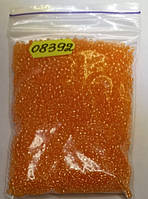 Бисер 10/0, №08392 оранжевый прозрачный с перламутровой срединкой (уп.50 грамм)