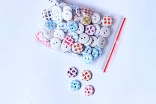 Гудзик круглий 15мм в клітинку (упаковка 100шт.)