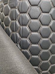 Автомобільний шкірозамінник на килимку в машину