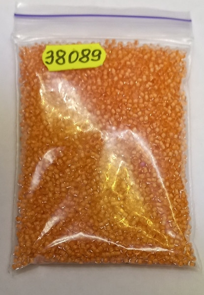 Бісер 10/0, колір No38089 прозорий із жовтогарячою серединкою (пап.50 грамів)