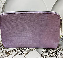 Ніжна та вмістима косметичка Lancome