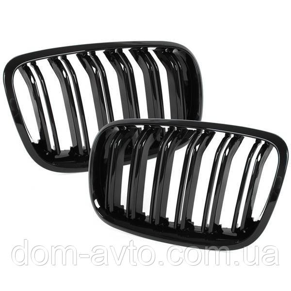 BMW X5 E70 06-13 муляжі між фарами (нирки) ліва+права комплект ЧОРНА ГЛЯНЦЕВА ПОДВІЙНА БАРКА