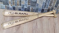 Бейсбольная бита с логотипом марки "Subaru"