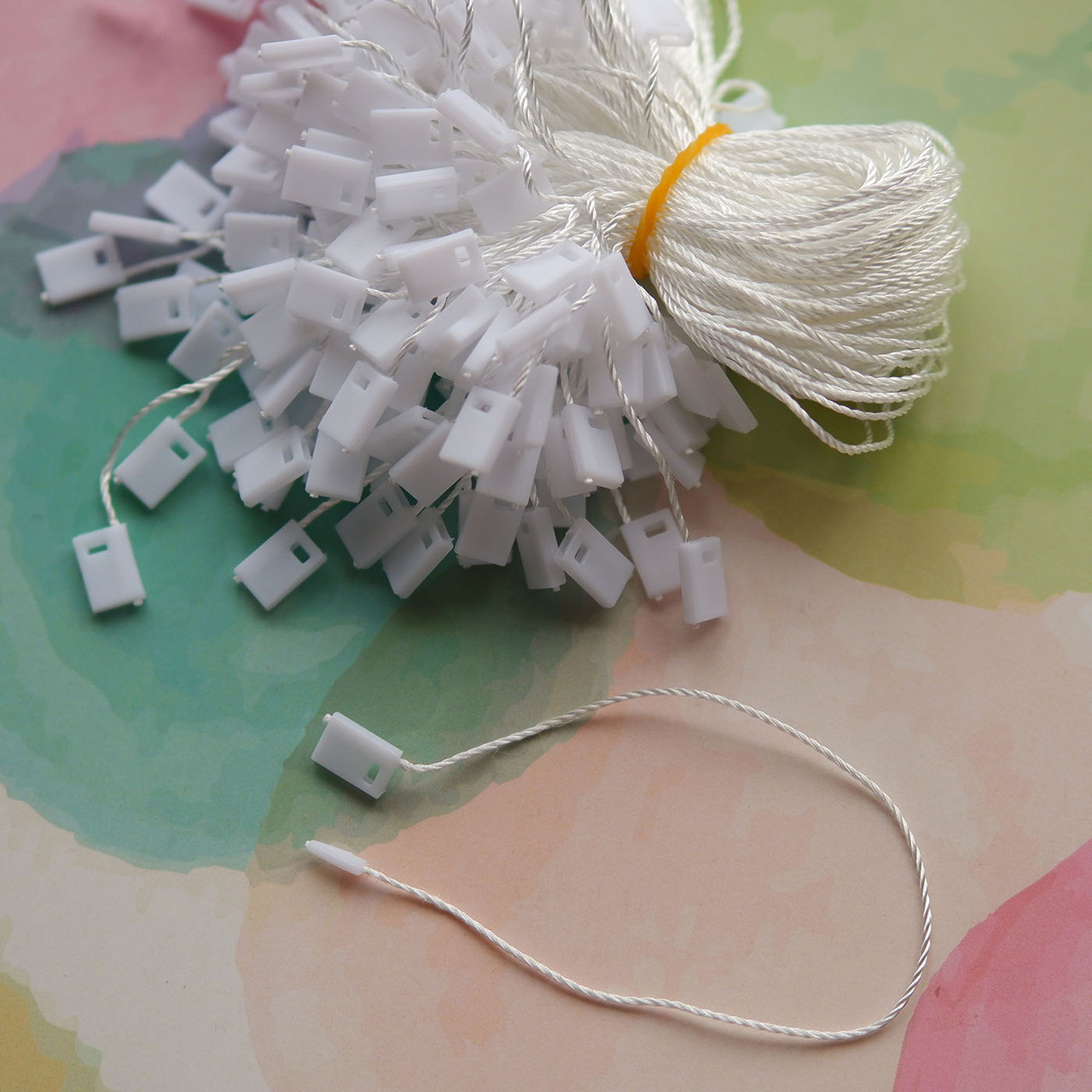 Купить Биркодержатели с пломбой, белые 100шт стандарт, цена 60 ₴ — Prom ...