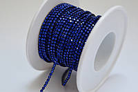 005SS4 Стразовая цепь сobalt blue в оправе под цвет страз плотная (1.5 мм).Цена за 10 см