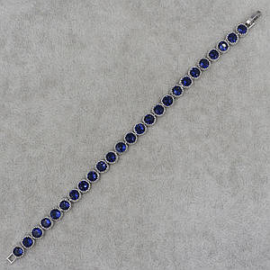 Браслет женский узкий мягкий серебристый с кристаллами белыми и синими длинна 18 см ширина 6 мм 1 ряд камней