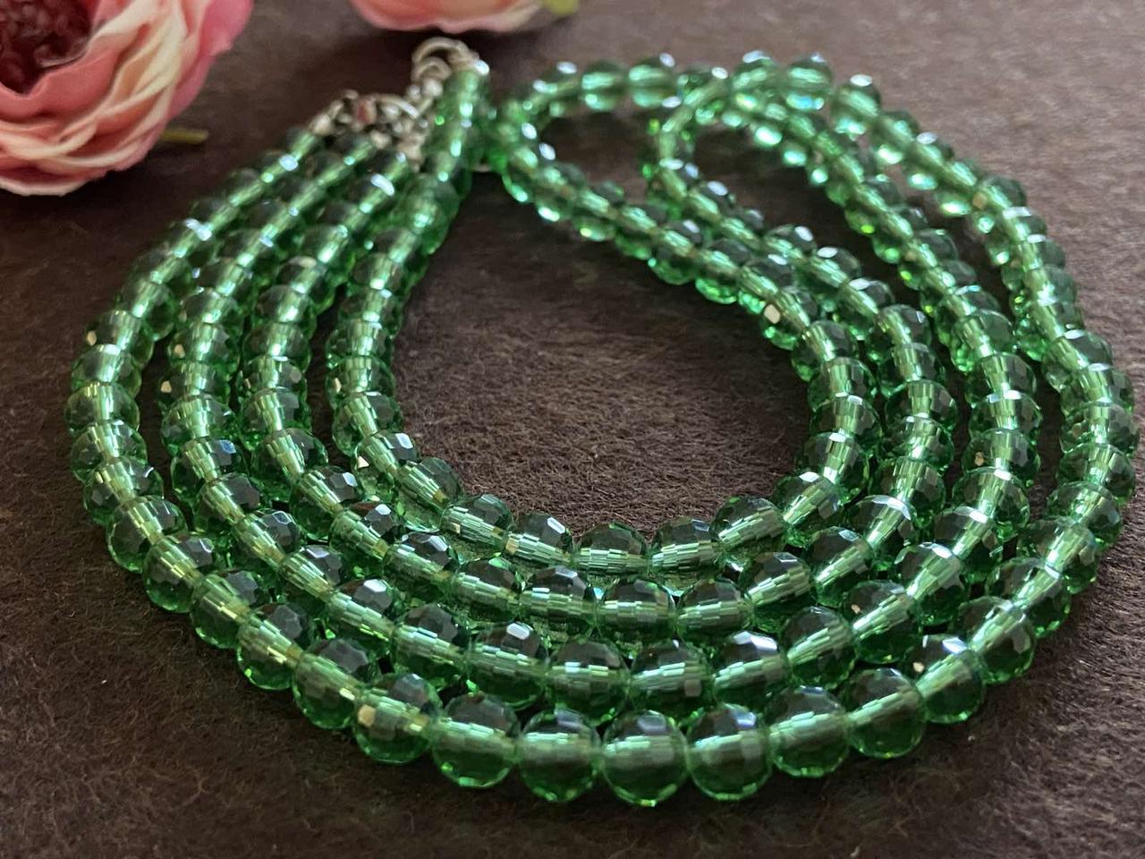 Бусини скло (хрусталь) 4х3мм пачка — 125-130 шт., колір — темний зелений прозорий