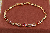 Браслет Xuping Jewelry восьмерки с тремя круглыми красными камнями по центру 17 см 8 мм золотистый